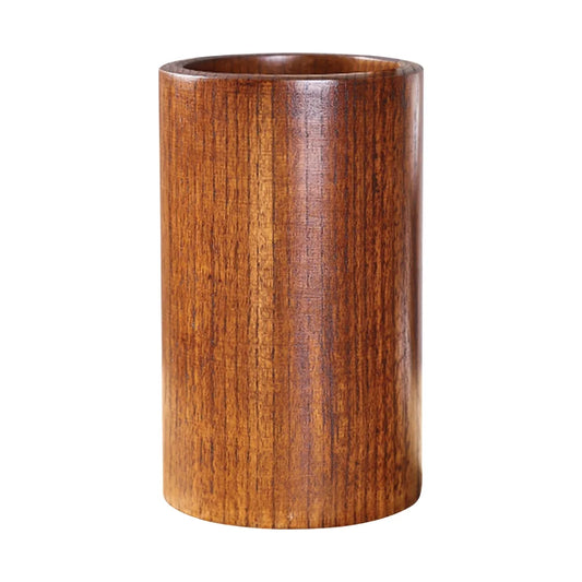 Pot ustensiles cuisine en bois avec spatules sur plan de travail minimaliste